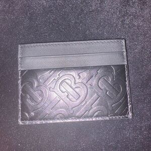 Brand new black Burberry  Embossed Leather Card Holder with authenticity  cert
